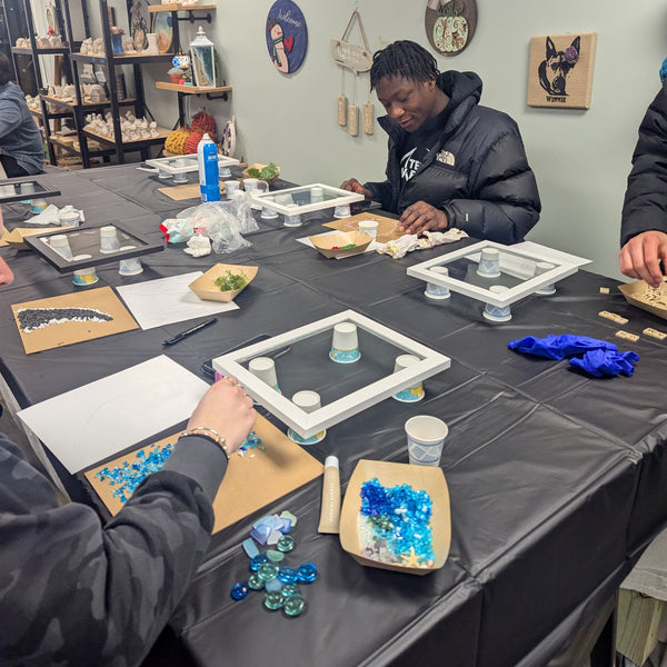Crafters hard at work on their resin projects.